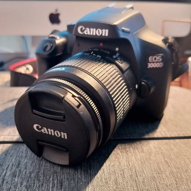 Canon EOS 3000D camera with 18-55mm lens.